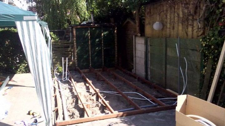 Tuinhuis met deuren en raampartij op maat